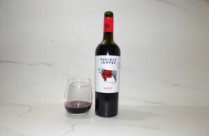 Tussock Jumper Malbec poured in glass